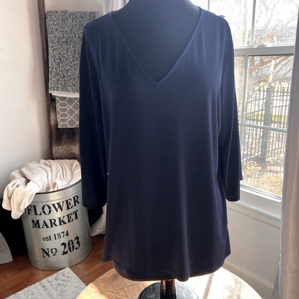 Michael Kors Navy Blouse with peek a boo sleeves. Gold small clips on sides.